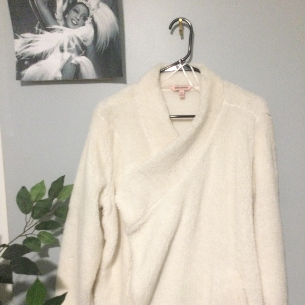 Furry wrap/jacket. Gently worn. Great condition.